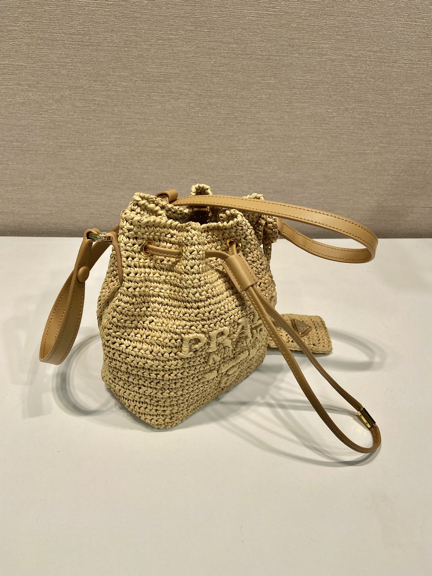 [TOP] Pra*da Raffia Bucket Drawstring Bag - Natural Beige - MYCUTIETHING