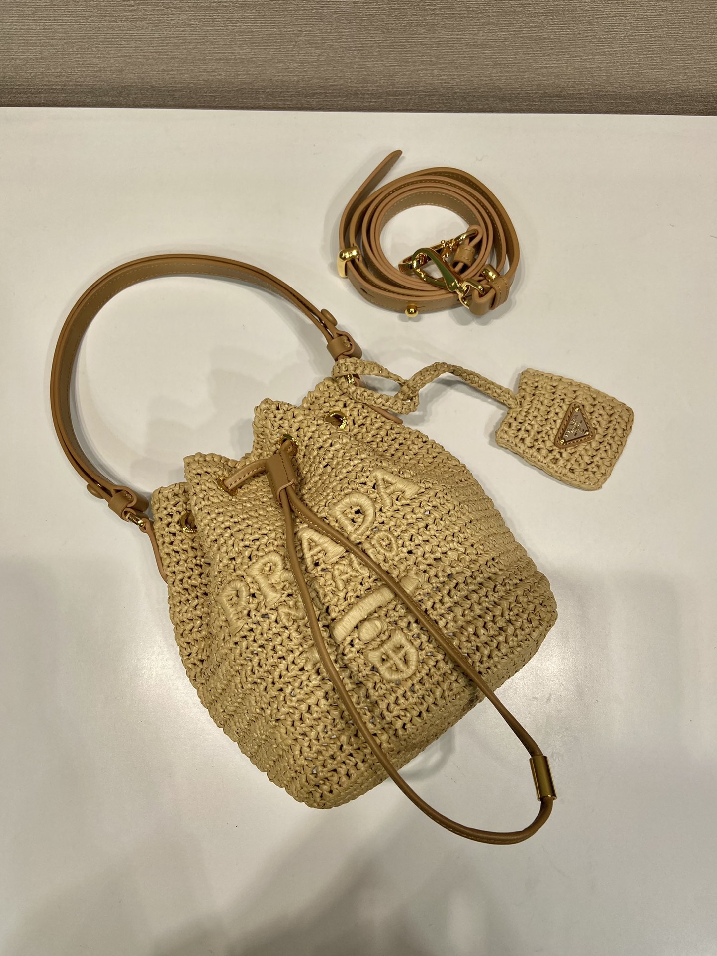 [TOP] Pra*da Raffia Bucket Drawstring Bag - Natural Beige - MYCUTIETHING
